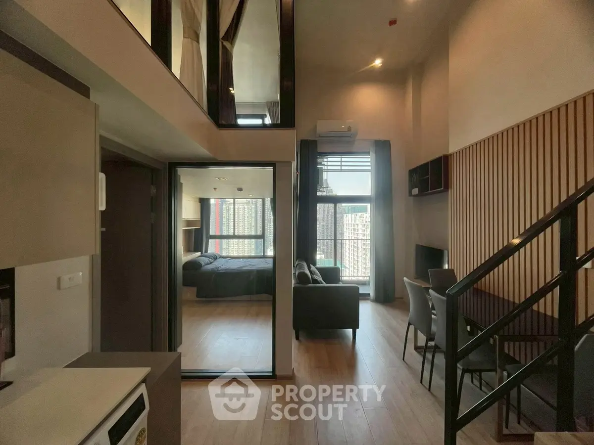 Modern loft apartment with open living area and stylish interior design
