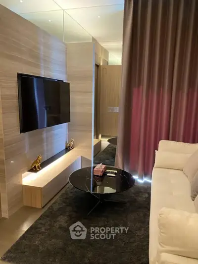 Luxurious modern living room with sleek TV setup and elegant decor