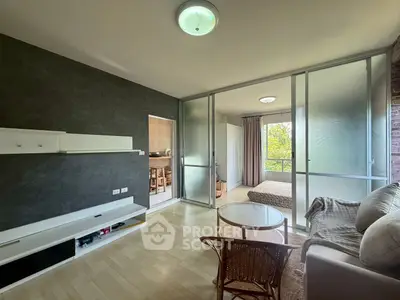 Spacious living room with modern decor and natural light