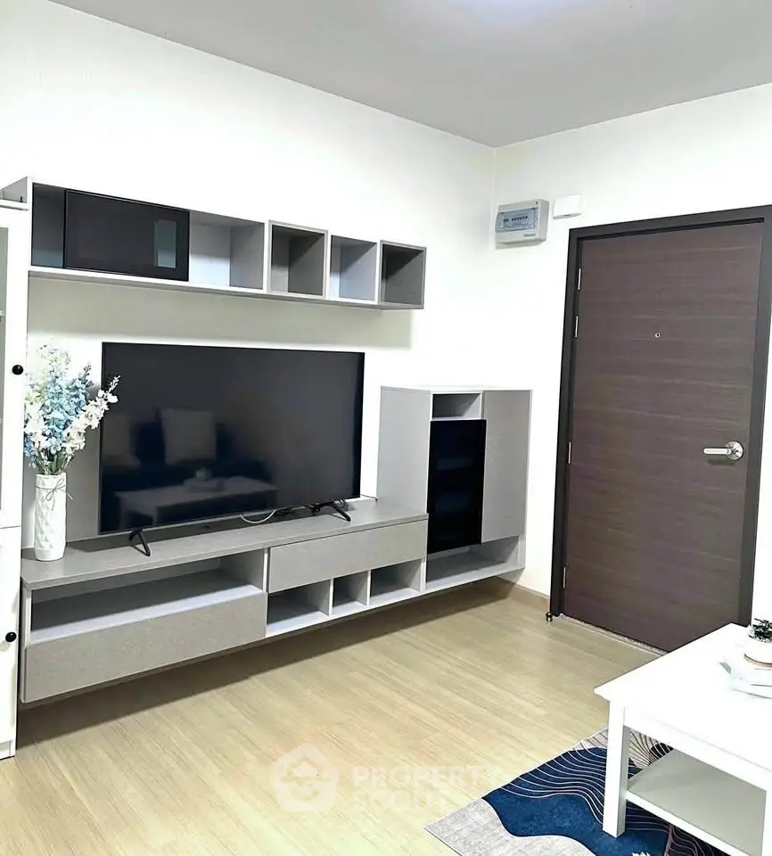 Modern living room with sleek TV unit and stylish decor