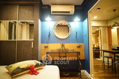 Chic modern bedroom with stylish decor and air conditioning