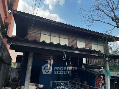 Charming rustic wooden house with traditional design and spacious outdoor area.