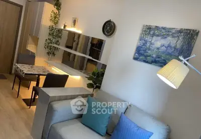 Modern living room with stylish decor and cozy seating area, perfect for relaxation and entertaining.