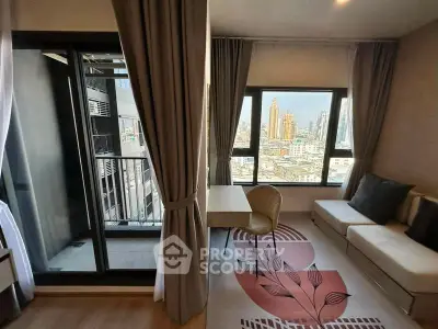 Modern living room with city view and balcony access in high-rise apartment