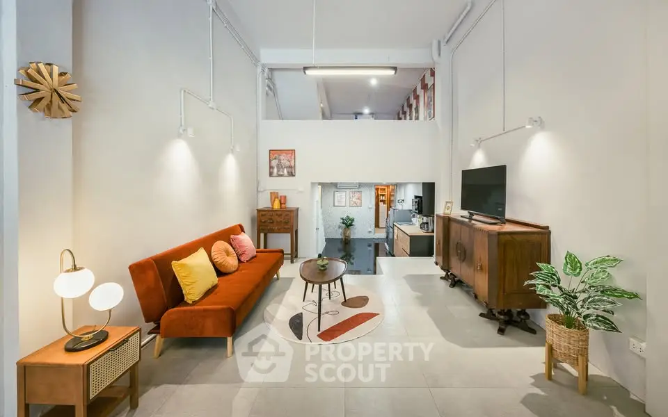 Stylish living room with modern decor and vibrant sofa in open layout