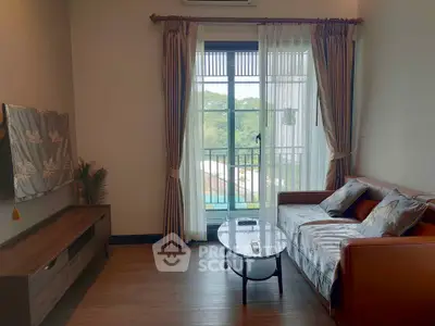 Cozy living room with balcony view and elegant decor