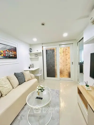 Modern living room with cozy sofa and stylish decor