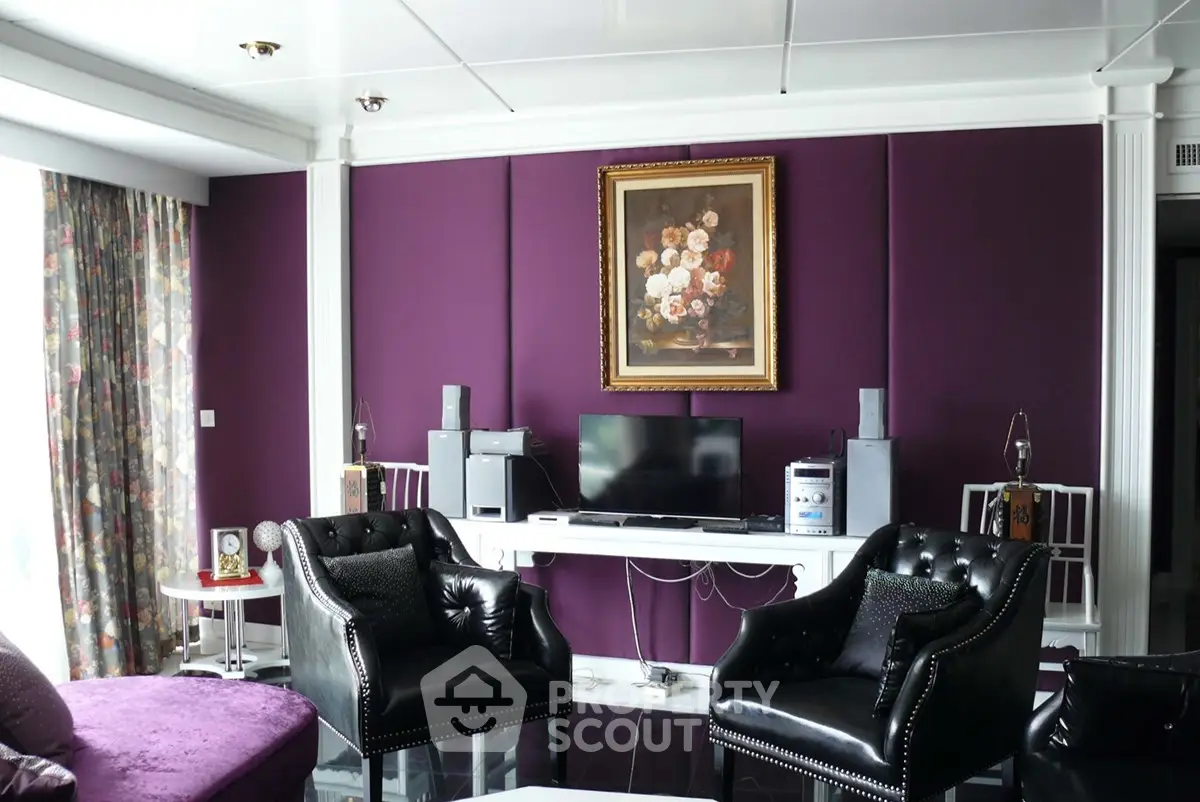 Luxurious living room with elegant decor and modern entertainment setup
