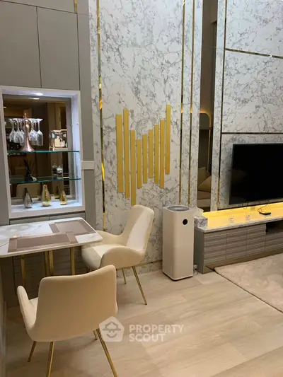 Luxurious modern living room with marble accents and elegant decor