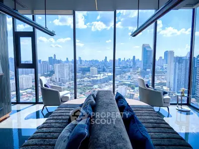 Luxurious high-rise living room with panoramic city skyline view