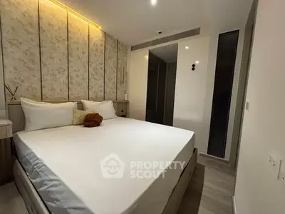 Luxurious modern bedroom with elegant decor and ambient lighting