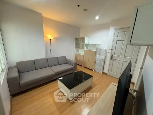 Modern living room with sleek furniture and ambient lighting