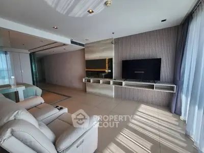 Spacious modern living room with sleek design and natural light