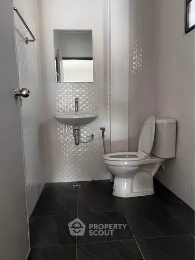 Modern bathroom with sleek fixtures and stylish tile design