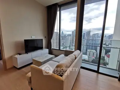 Modern living room with stunning city view from high-rise apartment