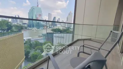Spacious balcony with stunning city skyline and river view, perfect for relaxation.
