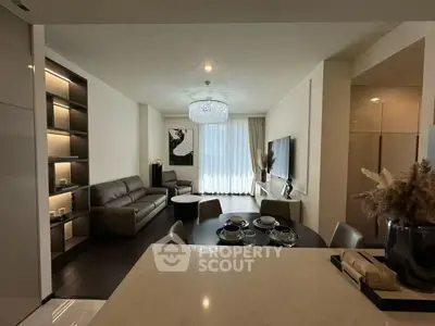 Luxurious modern living room with elegant decor and open dining area, perfect for entertaining.
