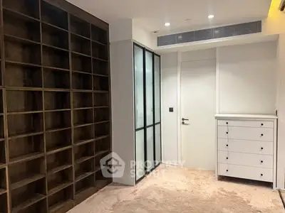Spacious storage room with wooden shelves and modern design