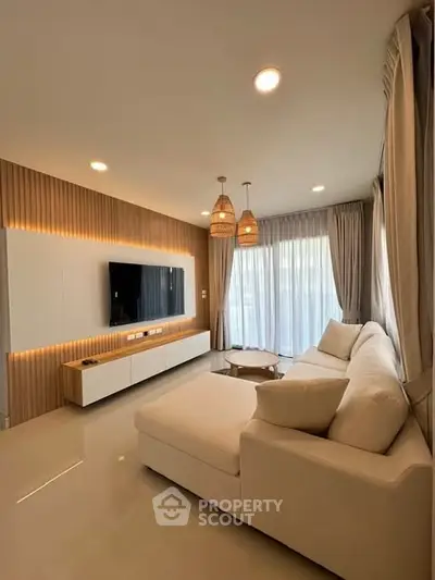 Modern living room with elegant decor and natural light