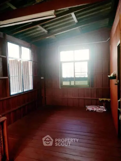 Charming rustic wooden interior with natural light and cozy ambiance.