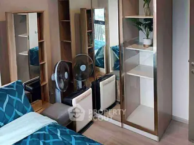 Cozy bedroom with mirrored wardrobe and modern decor