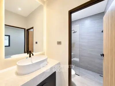 Modern bathroom with sleek design and spacious shower area