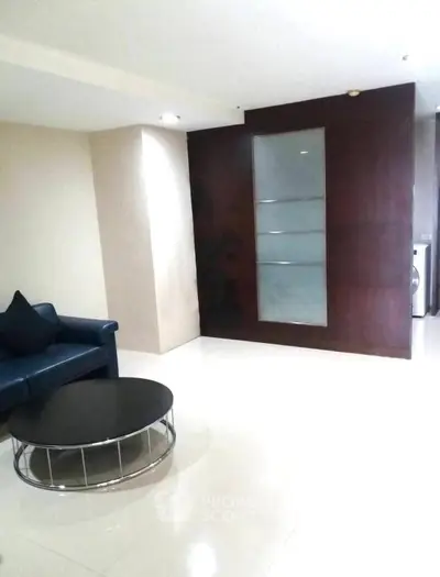 Modern living room with sleek furniture and minimalist design