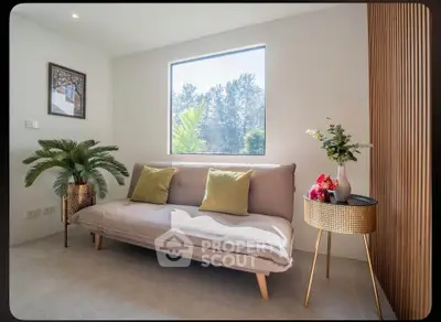 Bright and cozy living room with modern sofa and large window view