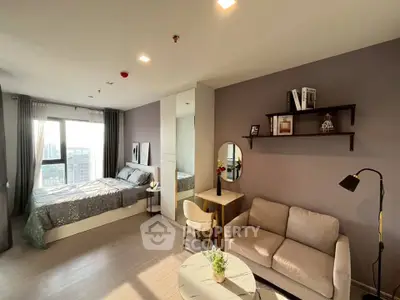 Modern studio apartment with cozy living area and stylish decor