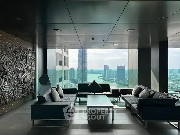 Luxurious rooftop lounge with stunning city view and modern seating area.