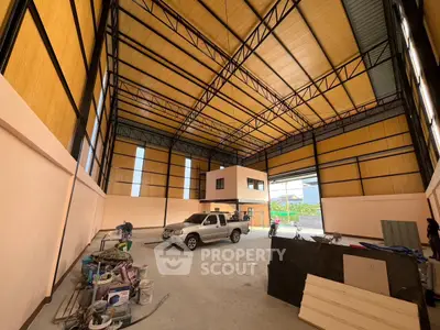 Spacious industrial warehouse with high ceilings and ample storage space