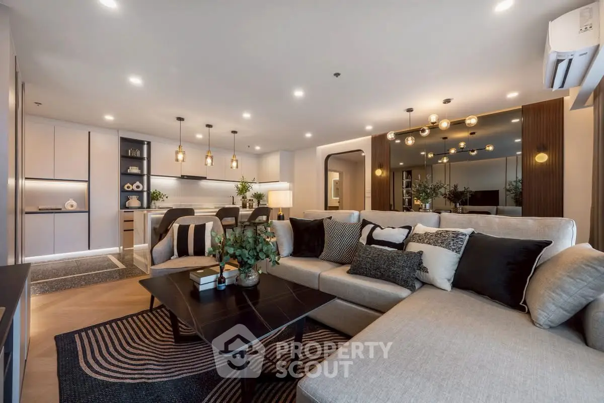 Luxurious modern living room with elegant decor and spacious seating area