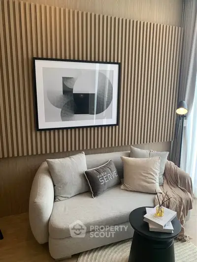 Modern living room with stylish decor and cozy seating area.