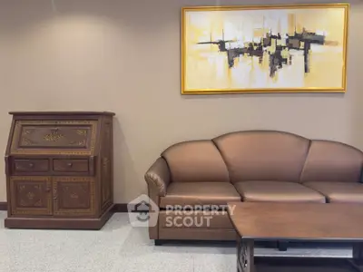 Elegant living room with classic furniture and modern art painting