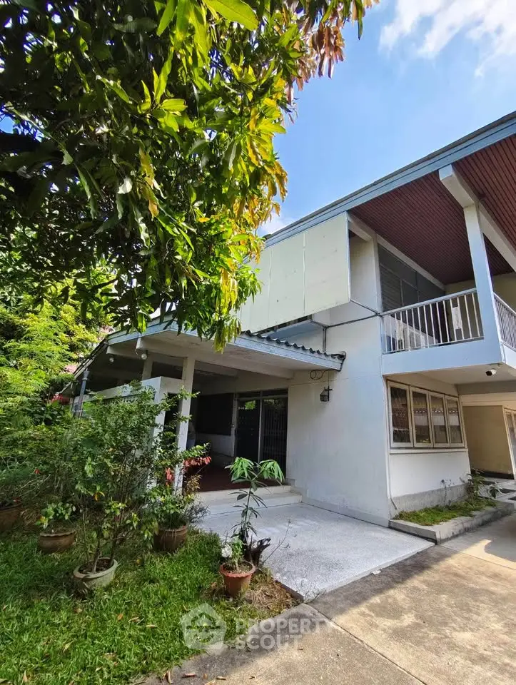Charming suburban home with lush garden and spacious balcony, perfect for family living.