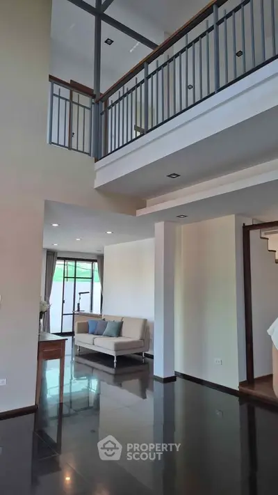 Spacious modern living room with high ceilings and elegant design