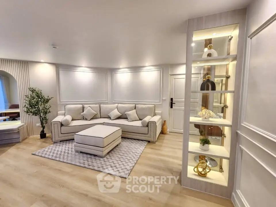 Elegant living room with modern decor and cozy seating area