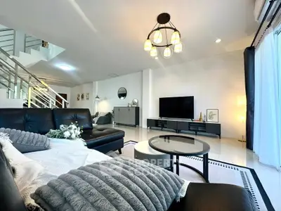 Spacious modern living room with elegant decor and natural light