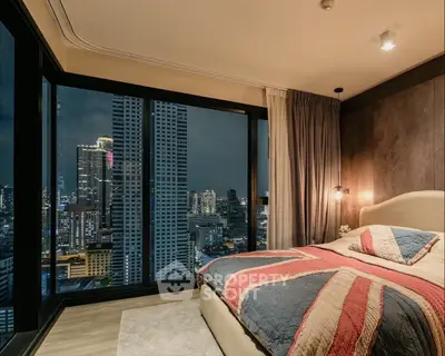 Luxurious bedroom with stunning city view in high-rise apartment