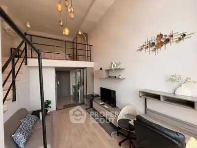 Modern loft-style living room with mezzanine and stylish decor