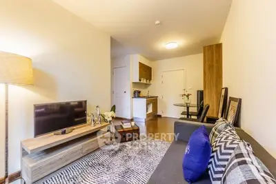 Modern living room with stylish decor and open kitchen layout
