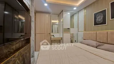 Luxurious modern bedroom with elegant decor and ambient lighting