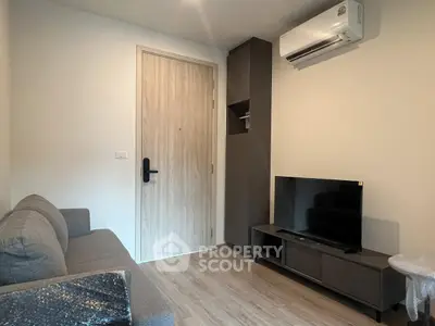 Cozy living room with modern furniture and air conditioning