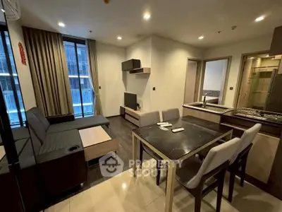 Modern living room with stylish furniture and open layout in a contemporary apartment.