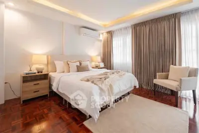 Luxurious bedroom with elegant decor and natural light