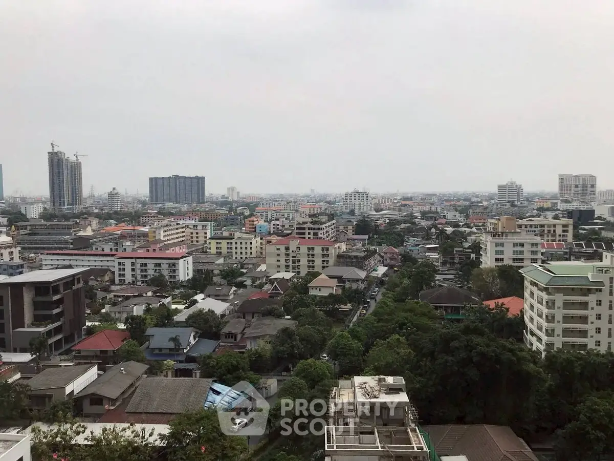 Stunning cityscape view showcasing urban living with diverse architecture and lush greenery.