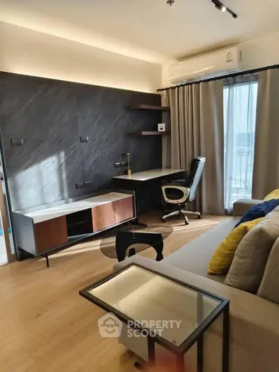 Modern living room with stylish furniture and natural light