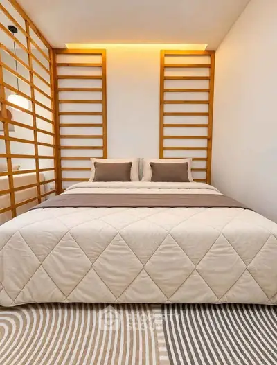 Modern bedroom with stylish wooden accents and cozy bedding