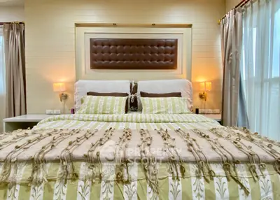 Luxurious bedroom with elegant decor and ambient lighting
