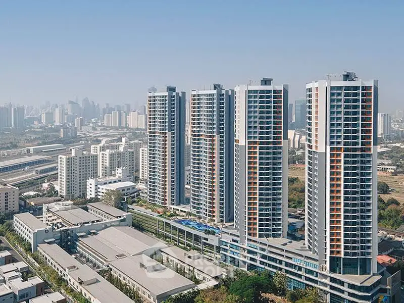 Stunning high-rise residential towers with panoramic city views, perfect for urban living.